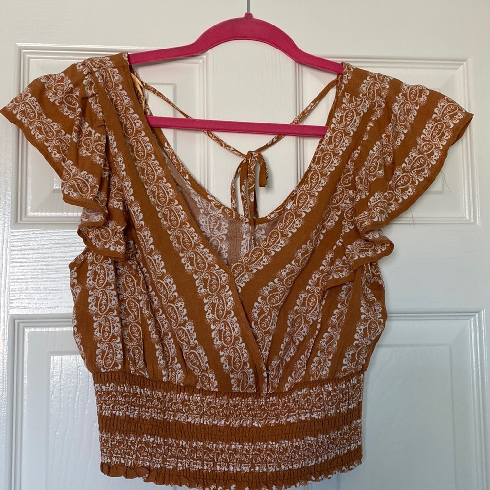 Brand new with tags🚨adorable cropped, burnt Orange shirt. Perfect for summer!
